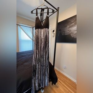 Long dress with metal ring detail.